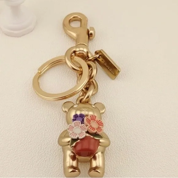 Coach Gold Bear Keychain with Flowers - Picture 1 of 4